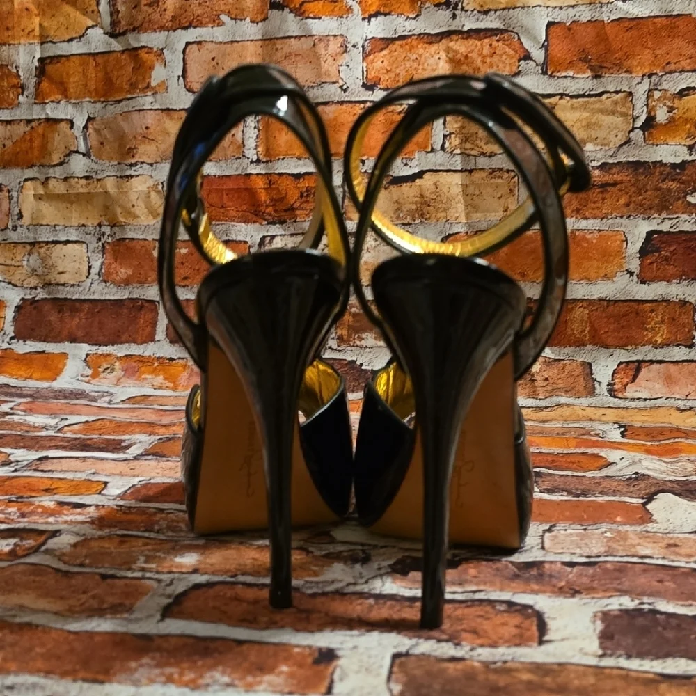 Report Signature Glossy Black Peep-Toe Heels
